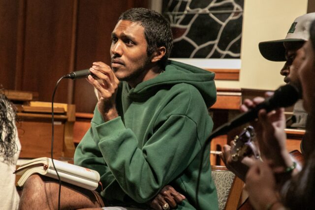 Missouri City senior Ryan Oommen helps lead worship during "Awake" Friday night at Elliston Chapel. Hannah Webb | Opinion Editor