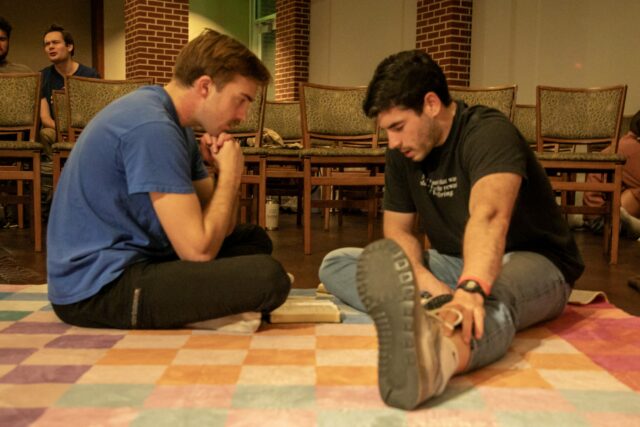 Students break out into small prayer groups during "Awake" on Friday night at Ellison Chapel. Hannah Webb | Opinion Editor