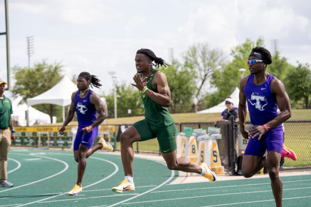 Graduate sprinter Malik Franklin edges out against other runners at the Baylor Invitational track meet at Clyde Hart Track and Field Stadium on Friday afternoon. Caleb Garcia | Photographer