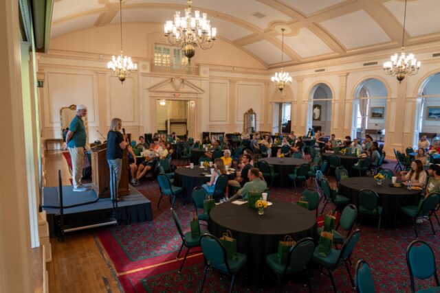 Students who are about to head off to work at various summer camps shared in a moment of fellowship during the Camp Staff Commissioning Ceremony at the SUB on Monday. Sam Gassaway | Photo Editor