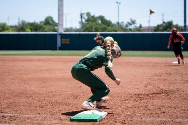 Junior infielder Leah Cran catches the ball for an out at first base during the Bears' ..... against Utah at Getterman Stadium on Sunday.