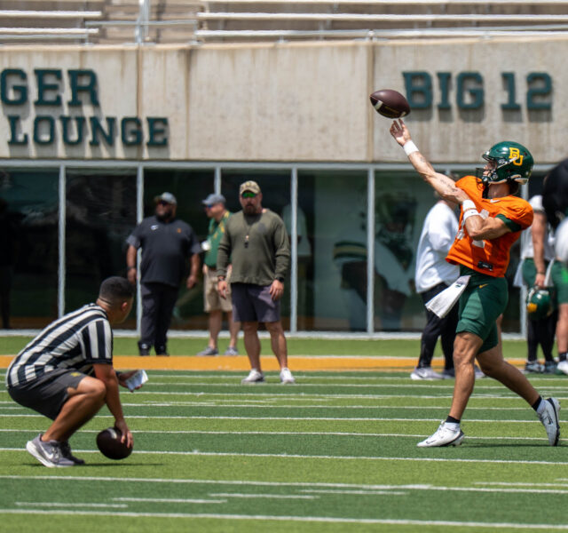 Redshirt sophomore quarterback Nate Bennett throws the ball at Baylor football open practice saturday afternoon at McLane Stadium. Alyssa Myers | Photographer