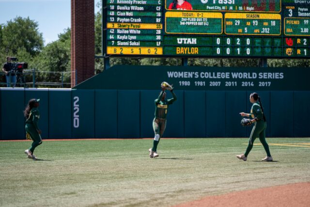 Senior outfielder Brooklyn Carter catches a ball in the outfield ...