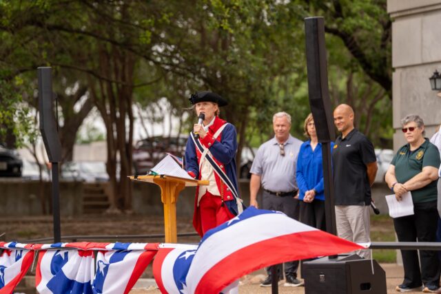 Dr. Julie Sweet speaks bout the importance of democracy at the Declaration of Independence reading at the Sub Bowl on Friday afternoon. Caleb Garcia | Photographer