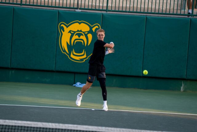 Graduate Alexandru Chrita fought hard, delivering a 7-5 victory during his match against Auburn. Sam Gassaway | Photo Editor