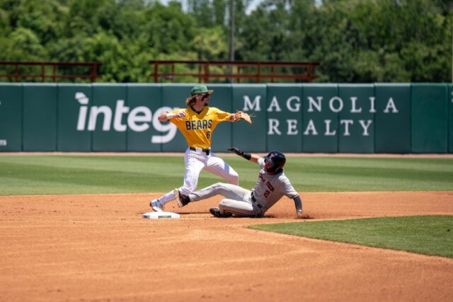 Redshirt junior infielder Travis Sanders gets Texas Tech's junior center fielder Kyeler Thompson out at second base during the Bears' ... against the Red Raiders on Sunday. Sam Gassaway | Photo Editor