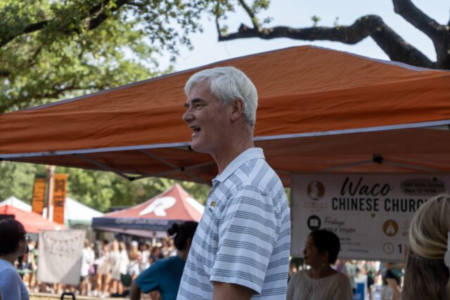 First Gentleman, Bradley Livingstone, greets different tables at the Church Fair at Fountain Mall on Friday at 10:00 AM. Vanessa Adams | Photographer