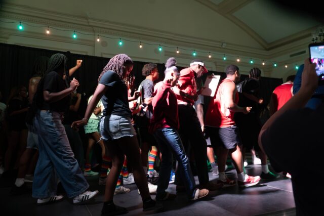 Attendees and performers dance together at the Mosaic Mixer at the Student Union Building on Wednesday night. Caleb Garcia | Photo Editor
