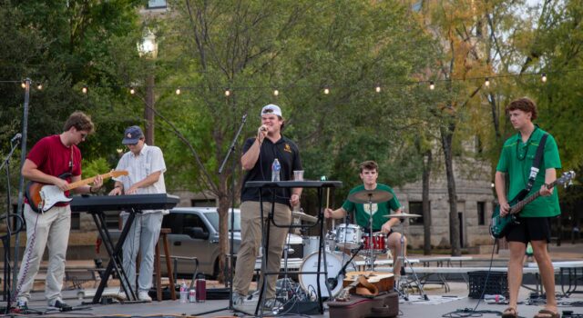 Local band The Ragwagon takes the stage Tri Delta's philanthropy event on Thursday evening. Lily LeMaire | Photo Intern