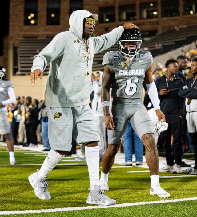 Colorado head coach Deion Sanders embraces Miller on the sidelines in Colorado's 24-21 loss to BYU in 2025. Photo courtesy of University of Colorado