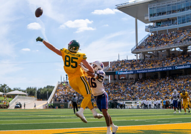 Senior tight end Matthew Klopfenstein jumps to complete a pass at the Louisiana Tech vs Baylor football game at McLane Stadium on Saturday afternoon. Caleb Garcia | Photo Editor