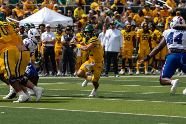 Junior quarterback Nate Bennet evades pressure in Baylor's 36-19 win over Louisiana Tech Saturday. Vanessa Adams | Photographer