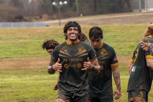 Dresser is all smiles after a muddy win to advance to the Texas state championship game. Photo courtesy of Baylor Rugby