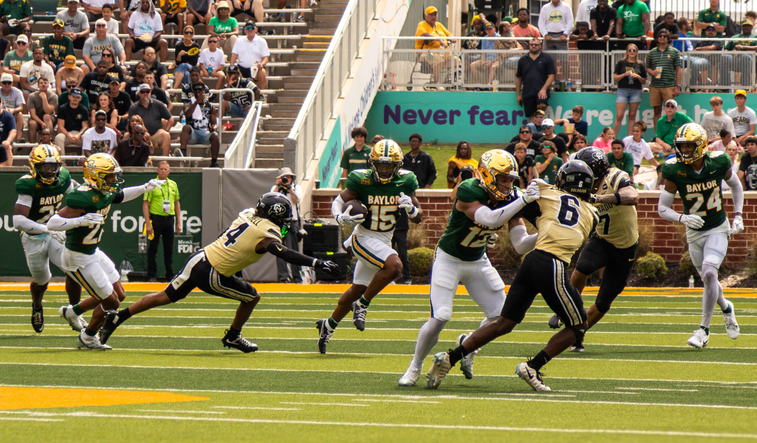 Sports Buzz: FB holds off Colorado in Big 12 opener, SOC continues to climb
