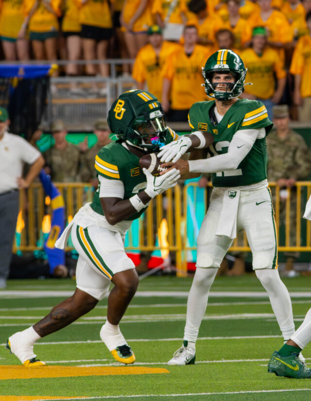 Junior Quarterback Nate Bennett passes the ball to Fifth year Reggie Bush II during Baylor's win against Prarie View A&M University 44-3 Saturday night at McLane Stadium. Mesha Mittanasala | Photographer