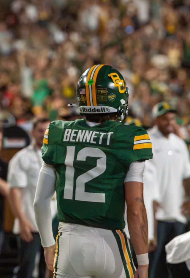 Junior Quarterback Nate Bennett passes the ball to Fifth year Reggie Bush II during Baylor's win against Prarie View A&M University 44-3 Saturday night at McLane Stadium. Mesha Mittanasala | Photographer