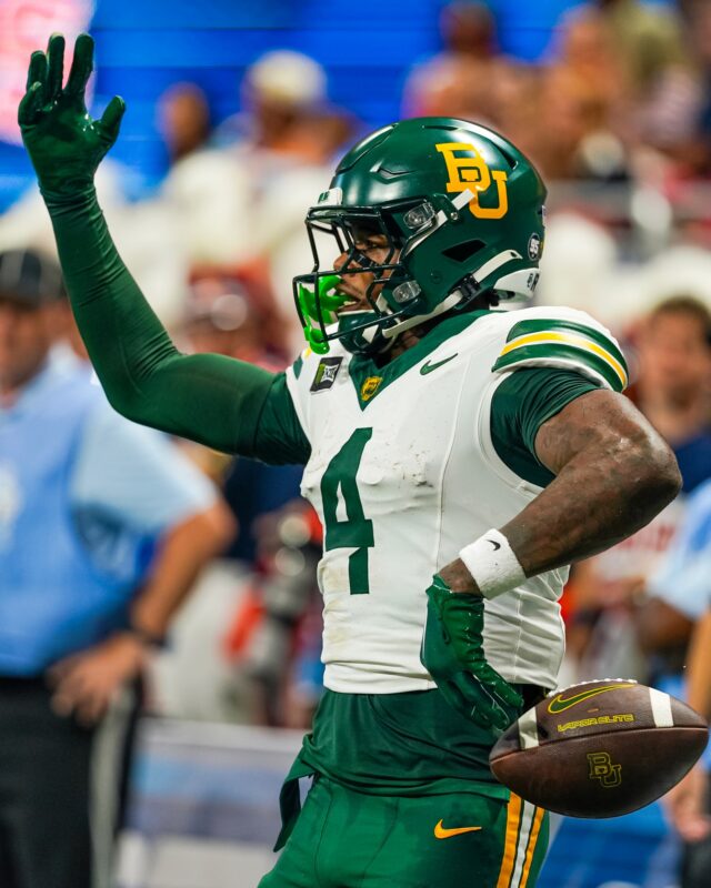 Fifth-year wide receiver Louis Brown IV celebrates after scoring a touchdown for Baylor. Photo courtesy of Baylor Athletics