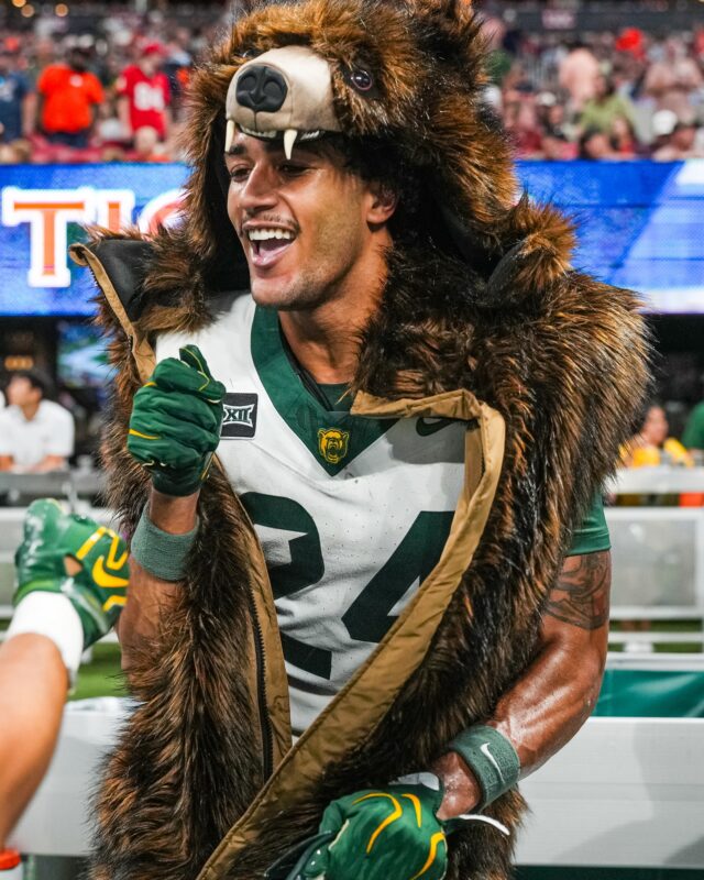 Senior safety Micah Gifford dons the "Turnover Bear" after being on the receiving end of Byrum Brown&squot;s third interception of the game. Photo courtesy of Baylor Athletics