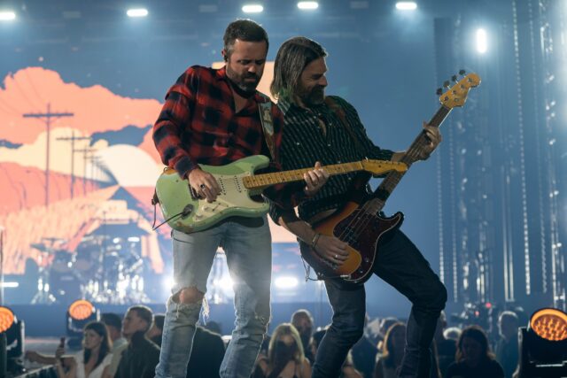 Members of Old Dominion shred their guitars together with their song "No Hard Feelings" at Foster Pavilion on Friday night. Caleb Garcia | Photo Editor
