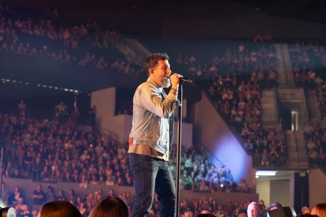 Lead singer of Old Dominion, Matthew Ramsey leads the crowd in the band&squot;s bluesy song "Make it Sweet" at Foster Pavilion on Friday night. Caleb Garcia | Photo Editor