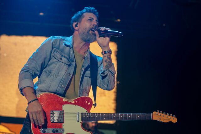 Lead singer of Old Dominion, Matthew Ramsey belts out their hit song "No Hard Feelings" at Foster Pavilion on Friday night. Caleb Garcia | Photo Editor