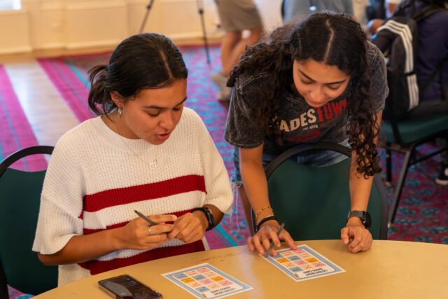 Attendees play bingo as a means to connect at LatinX night at the Student Union Building on Tuesday night. Caleb Garcia | Photo Editor