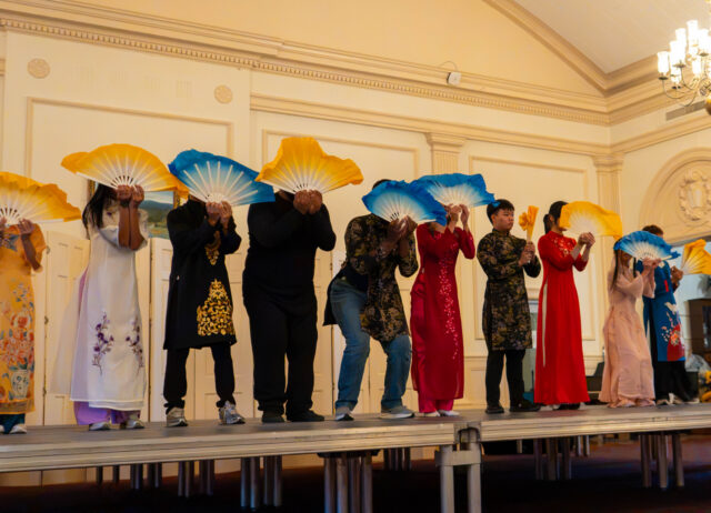 Students in the Vietnamese Student Association perform fan dance at the Autumn Moon Festival Friday evening in the SUB. Mim Robbins | Photographer