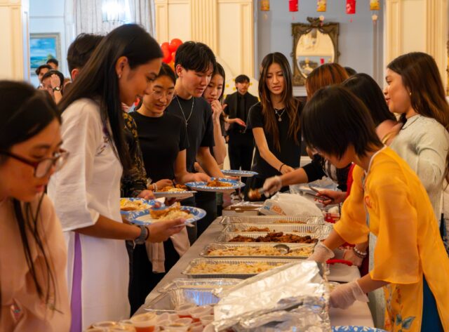 Students enjoy a traditional meal during the Vietnamese Student Association’s Autumn Moon Festival Friday evening in the SUB. Mim Robbins | Photographer