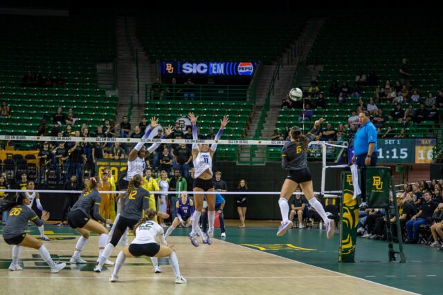 Sophomore outside hitter prepares to strike the ball during Baylor’s match against TCU at the Ferrell Center. Layla Bazan | Photographer