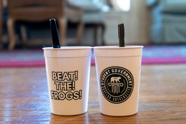 Students were able to grab a Dr. Pepper float in collectible cups to ramp up excitement for the rivalry game against TCU. Vanessa Adams | Photographer