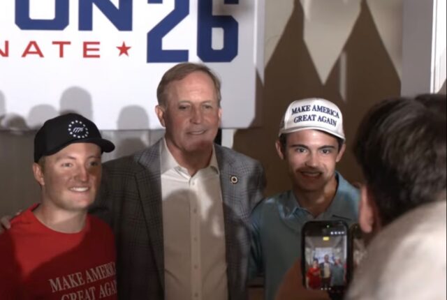Attorney General Ken Paxton takes photos with supporters following his campaign event Saturday morning at The Palladium. Owen Carson | Broadcast Reporter