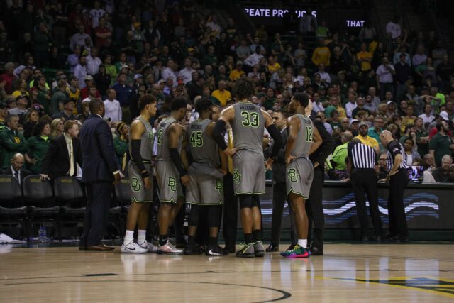 Baylor men’s basketball huddles up for a timeout against Texas Tech in 2020. Lariat file photo
