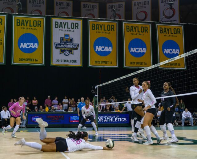 Senior libero Tehani Ulufatu dives for a pancake in Baylor volleyball's win over Houston Friday night. Mesha Mittanasala | Photographer