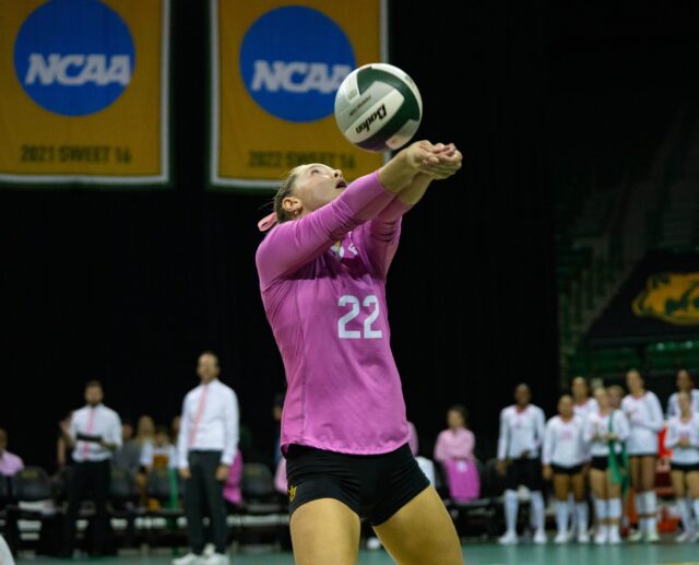 Sophmore Libero Morgan Maddison bumps the ball during