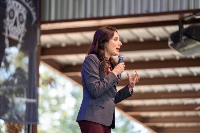 Gina Hinojosa, the Democratic nominee for Texas governor, addresses attendees during a campaign rally at The Backyard Bar Stage and Grill in Waco Tuesday, sharing her priorities ahead of the November election. Mesha Mittanasala | Photographer