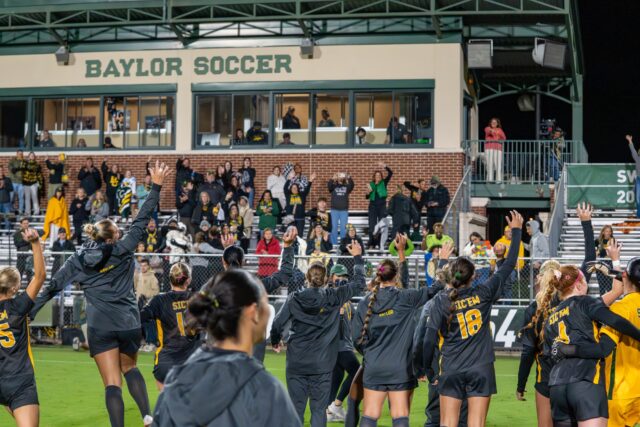 No. 13 Baylor soccer celebrates a 1-0 win against TCU with its fans Friday night at Betty Lou May’s field. Mesha Mittanasala | Photographer
