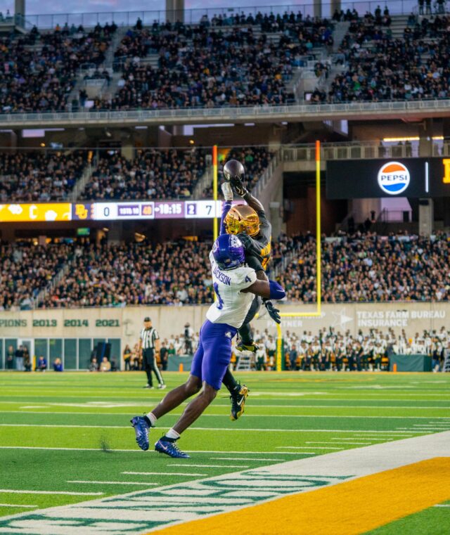 Sophmore wide reciever Taz Williams Jr. catches a pass during Baylor's loss against TCU 6-17 at Mclane Stadium saturday night. Mesha Mittanasala | Photographer