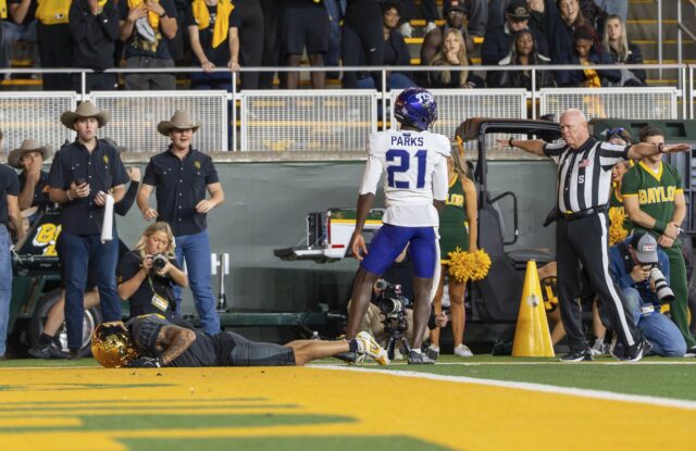 Junior receiver Jadon Porter lies face down in the end zone after dropping a potential touchdown in Baylor's 17-6 loss to TCU Saturday night. Mesha Mittanasala | Photographer
