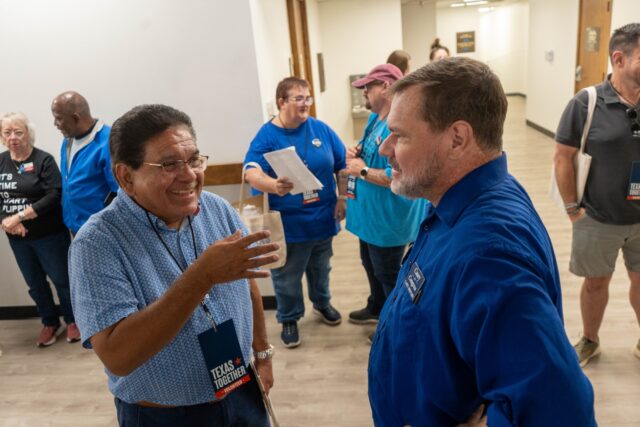 Democratic U.S House of Representatives Candidate Casey Shepard speaks with voters at