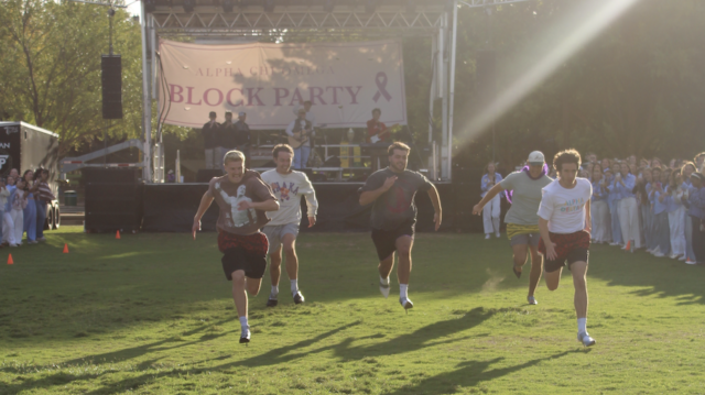 Participants in the high heel race for Alpha Chi Omega's Block Party take off running Friday evening at Fountain Mall. Photo courtesy of Lana McMenis