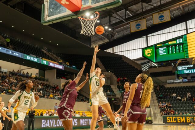 Junior forward-center Kate Koval shoots at the Baylor vs West A&M basketball game on Sunday afternoon at McLane Stadium. Caleb Garcia | Photo Editor