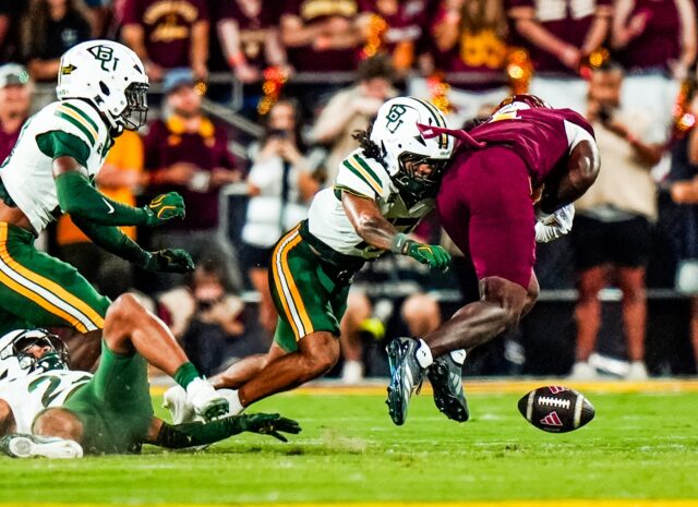 Senior safety Tyler Turner forces a fumble in the first quarter of Baylor's 55-19 win over Arizona State. Photo courtesy of Baylor Athletics